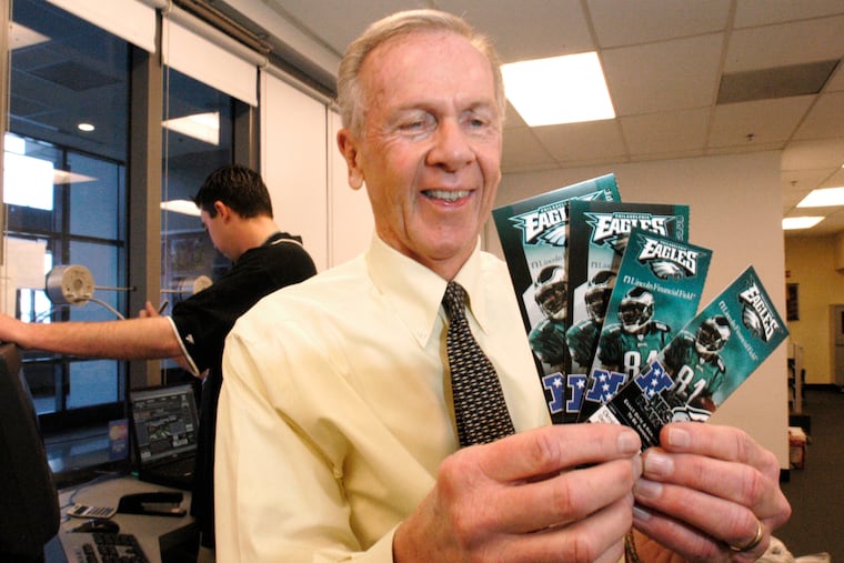 Mr. Carlin displays tickets to the Eagles playoff game against the Minnesota Vikings in 2005.