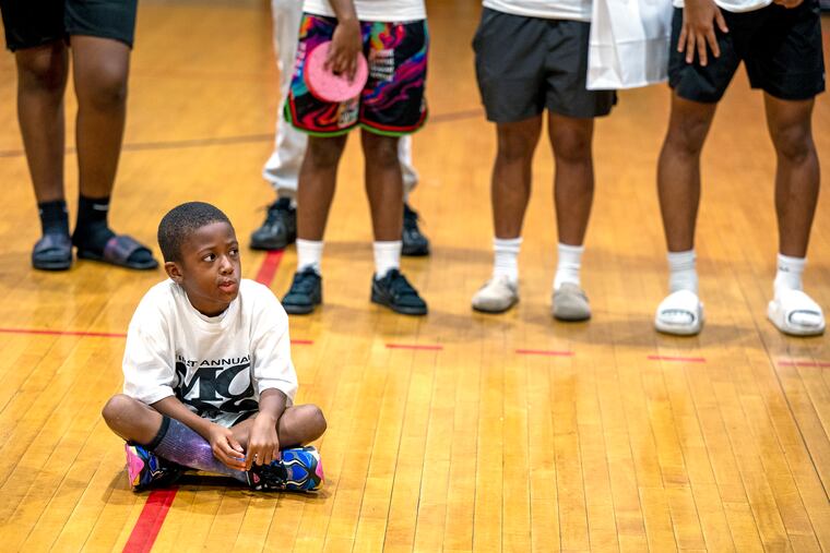 August 26, 2024: Mahij Austin, 7, is among the young players attending a free kids basketball camp at Imhotep Charter High School.