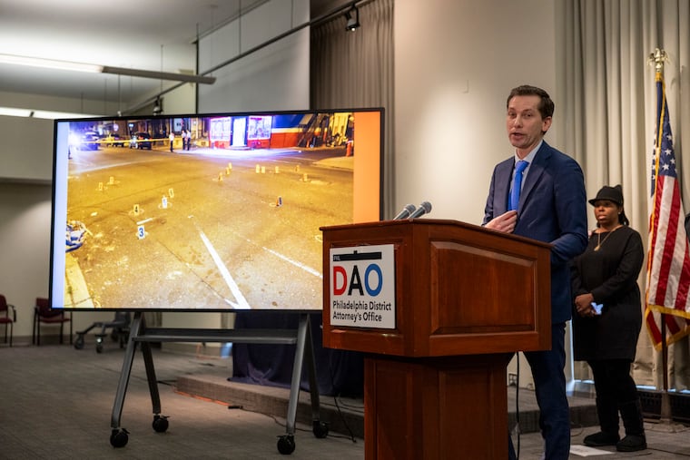 Bill Fritze, supervisor for the District Attorney’s Gun Violence Task Force, addresses reporters during a news conference on the arrest of 19 defendants that prosecutors say are connected to the Young Bag Chasers street gang.