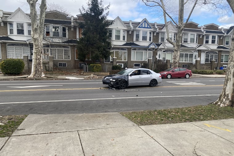 Police say a man who was fatally shot by a homeowner in the 5800 block of Cobbs Creek Parkway Tuesday morning attempted to flee in this car after attempting to steal the catalytic converter from the homeowner's car. The car collided with a school bus and came to rest in the middle of the street.
