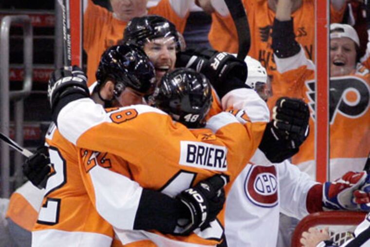 The Flyers celebrate their 6-0 victory over the Canadiens in Game 1 on Sunday. (Yong Kim / Staff Photographer)
