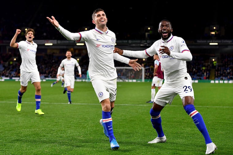 Chelsea's Christian Pulisic (center) celebrates scoring his team's third goal of the game against Burnley.