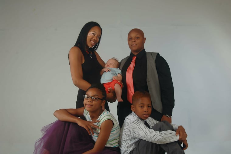 The Holland-Herder family. Standing: Terinae (holding Justus),
and Aniesha, with kids Qaaniesha and Josiah.