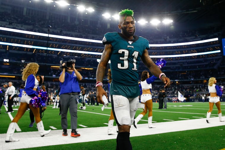 Cornerback Jalen Mills walks off the field after the Eagles lost to the the Dallas Cowboys, 37-10, on Sunday in Arlington, Texas.