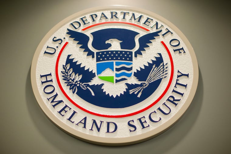 The Homeland Security logo, shown during a news conference in Washington.