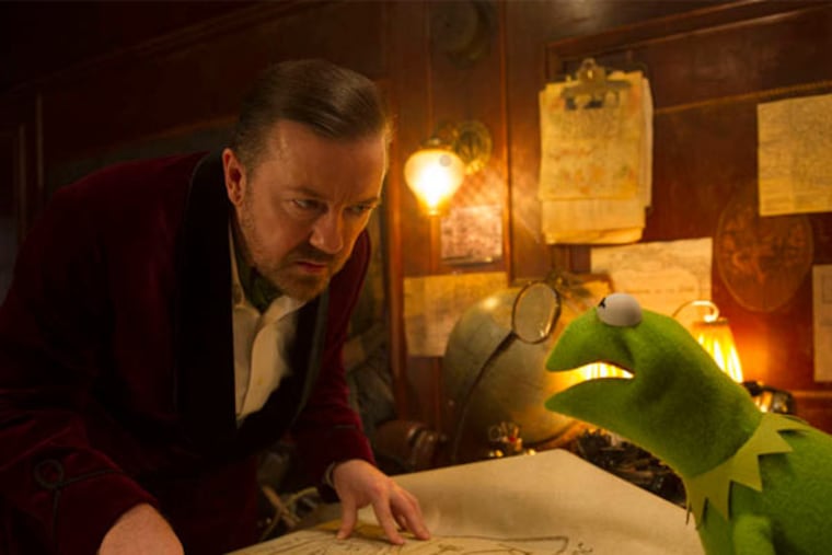 Ricky Gervais with Constantine the Kermit copy.