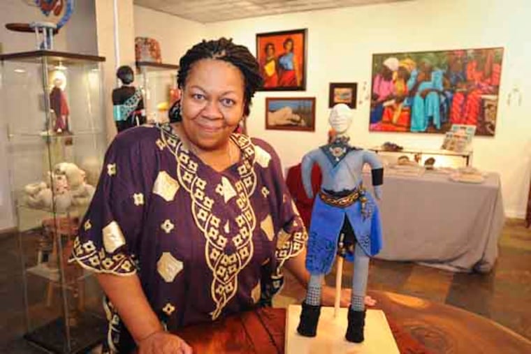 After a career running museum, Kimberly Camp, former head of the Barnes, opens her first gallery, Galerie Marie, in Collingswood. Here she poses with one of her doll creations. July 12, 2013 ( RON TARVER / Staff Photogapher )