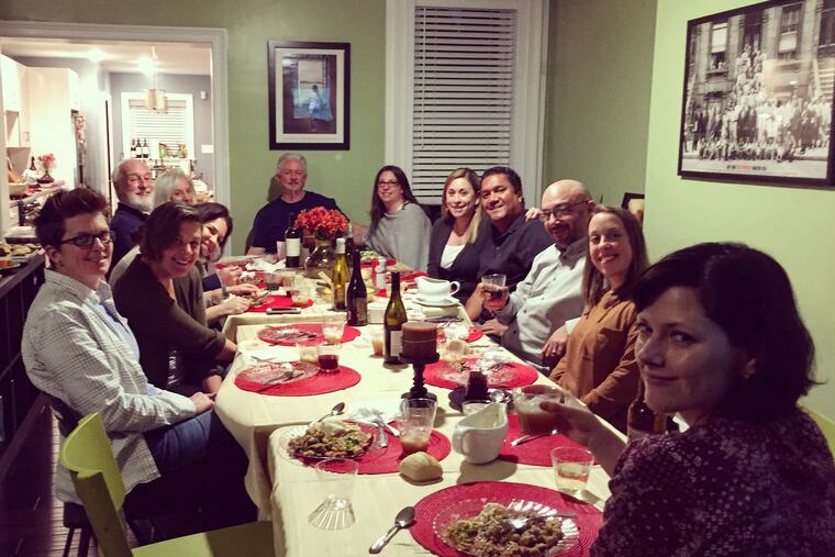 Kate Stephan (far left) and Jaclyn Smith-Spade (far right) with members of the Bodine Street "framily" at Thanksgiving in 2017.