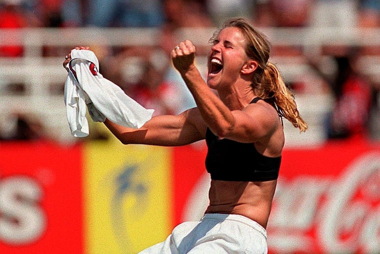 Brandi Chastain reacts to her winning penalty kick that captured the 1999 World Cup at the Rose Bowl.