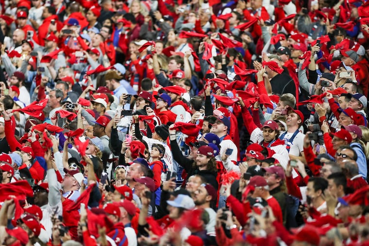 Philadelphia Phillies fans wave their rally towels during Game 3 of the World Series against the Houston Astros at Citizens Bank Park in Philadelphia on Tuesday, Nov. 1, 2022.