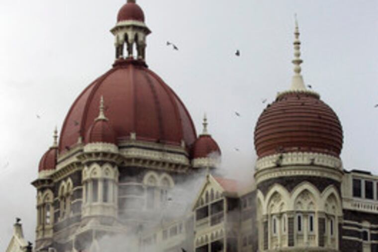Smoke billows from the Taj Mahal hotel in Mumbai, India, formerly known as Bombay.