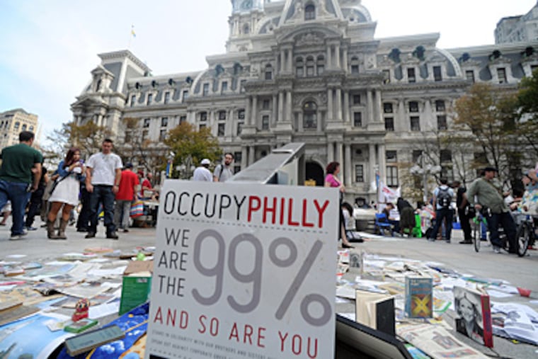 On a sunnier day, the Occupy Philly protest outside City Hall in Dilworth Plaza. October 10, 2011 (SARAH J. GLOVER / STAFF PHOTOGRAPHER)