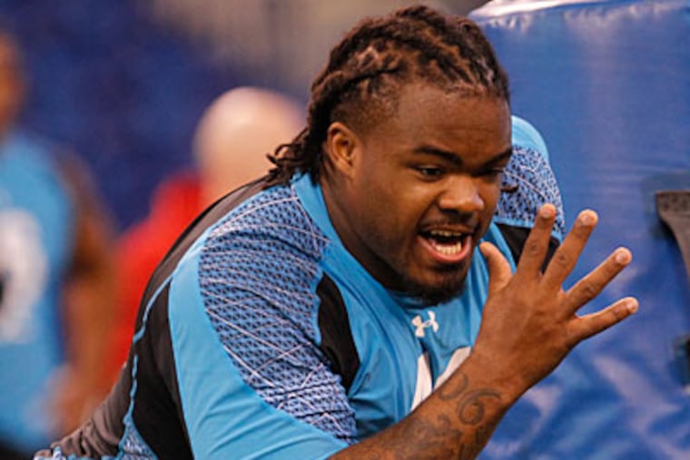 Dontari Poe is one of several defensive tackles the Eagles could choose with the 15th pick in the draft. (Dave Martin/AP)