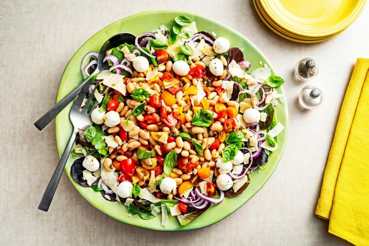 With tomatoes, mozzarella and Parmesan, this salad has many of the elements of a simple pizza, except the crust.