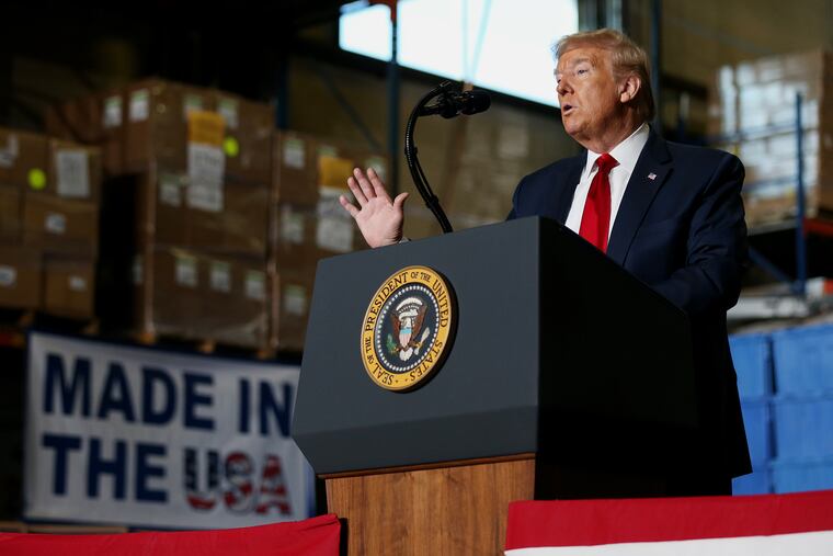 President Donald Trump speaks to workers during a visit to the Owens & Minor medical equipment distribution center in Allentown on Thursday.