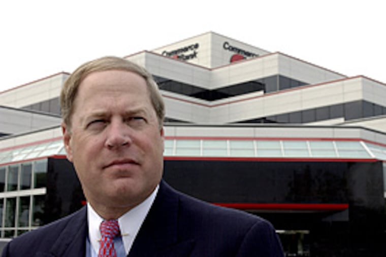 Hill outside the company's Cherry Hill headquarters in 2003.