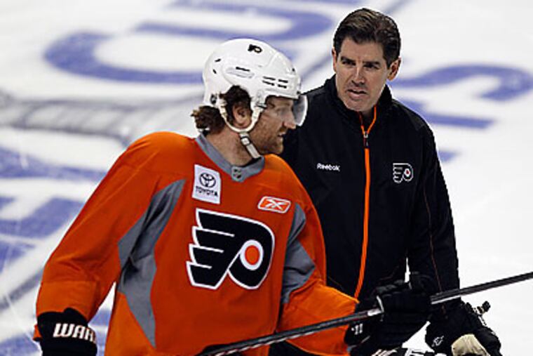 "I think we're more disciplined in what we do," Flyers coach Peter Laviolette said. (Yong Kim/Staff Photographer)