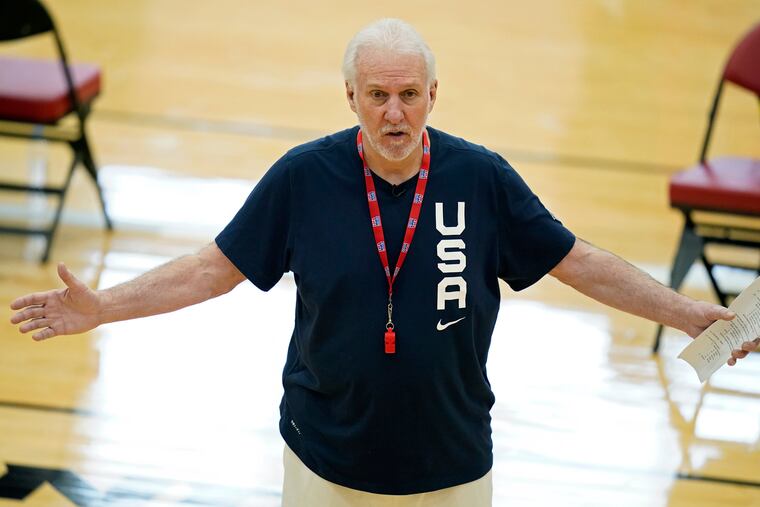 Gregg Popovich, Team USA's head coach, speaks with his players during training in Las Vegas.