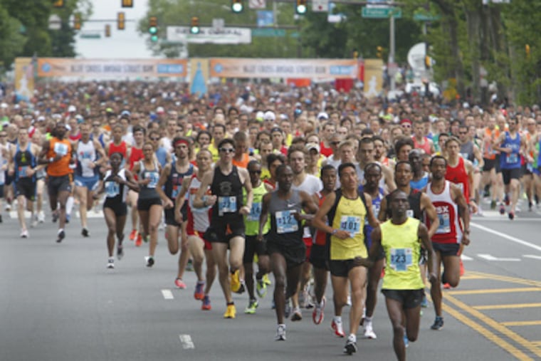 Henry Rutto of Kenya started the Blue Cross Broad Street Run in North Philadelphia as the front-runner and led the entire way. (Akira Suwa / Staff Photographer)