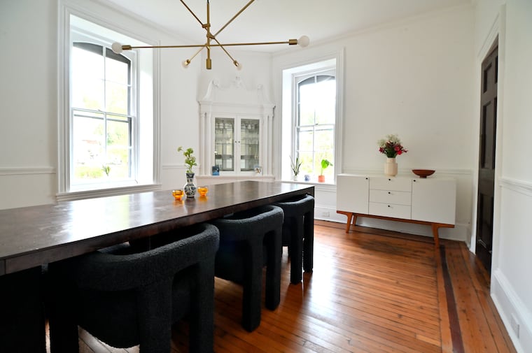 The dining room features a double-hinged door (seen to the right) to ease access to the kitchen.