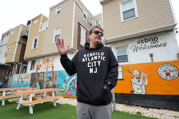 Kurt Kwart talks about Atlantic City tourism while standing in the outside seating area at Tennessee Avenue Beer Hall. His Airbnb overlooks the courtyard.