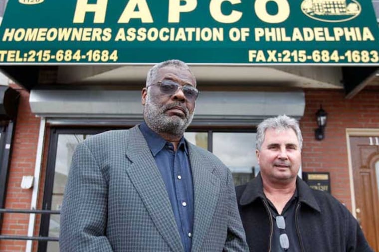 Victor Pinckney (left), a vice president of the landlord association HAPCO Philadelphia, with Jim Sims, a HAPCO board member, in a file photo. Pinckney commended the city for its loan program to help small landlords through the coronavirus pandemic but said it's not enough.