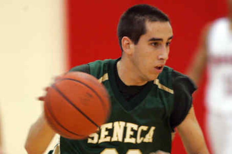 Seneca's Rich McNamara drives down court in the 66-64 overtime victory over Kingsway.