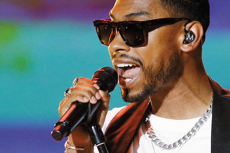 Singer Miguel performs before accepting the Best Male Artist Award at the 2013 Young Hollywood Awards. (Photo by Danny Moloshok/Invision/AP)