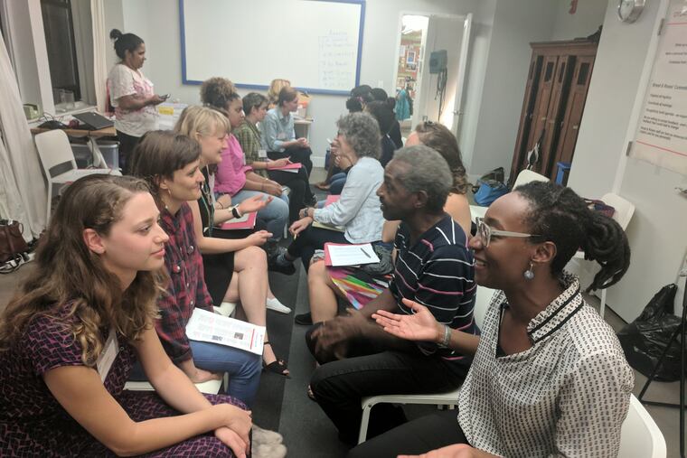 Jennifer Jordan (right, front) practices fundraising pitches with her Giving Project group.