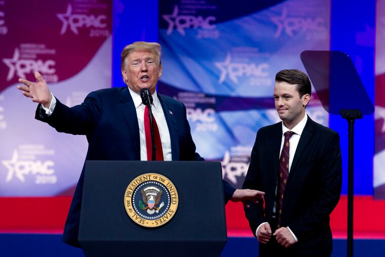 President Donald Trump invites to speak in the podium to Hayden Williams, a field representative of the Leadership Institute, who was assaulted at Berkeley campus speaks at Conservative Political Action Conference, CPAC 2019, in Oxon Hill, Md., Saturday, March 2, 2019.