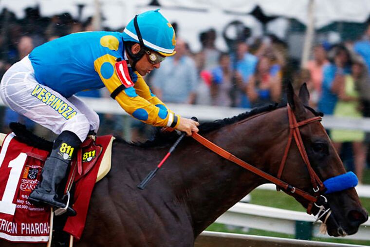 Victor Espinoza aboard American Pharoah during the 140th Preakness Stakes at Pimlico Race Course. (Geoff Burke/USA Today)