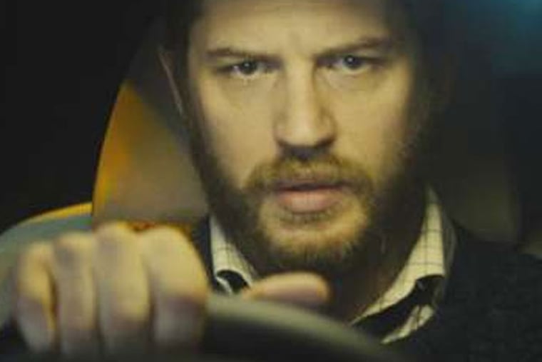 Tom Hardy stars as Ivan Locke, a man in a car with a Bluetooth on his way to a London hospital, trying mile by mile to keep his life together.