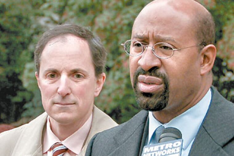 Mayor Nutter with Rob Dubow, the city finance director, who said the contract would cost an extra $146 million over five years. (David Swanson / Staff Photographer)