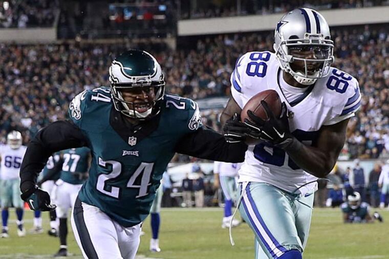 The Cowboys' Dez Bryant catches a touchdown pass past Bradley Fletcher. (David Maialetti/Staff Photographer)