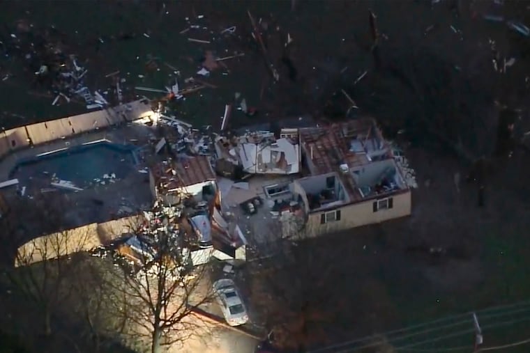 A structure is damaged after a tornado touched down in Wayne, Okla., early Tuesday.
