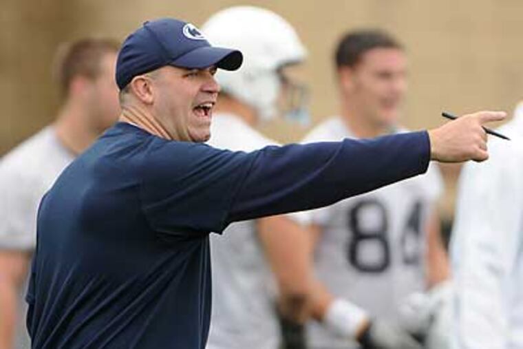 Penn State football coach Bill O'Brien gestures to his players during practice on Monday. (The Centre Daily Times/AP)