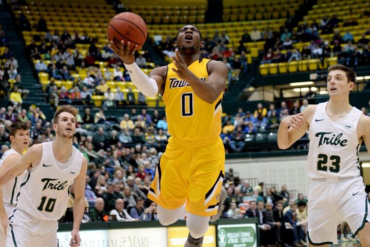 Towson guard Zane Martin (0) taking the ball to the hoop against William and Mary on Jan. 13.