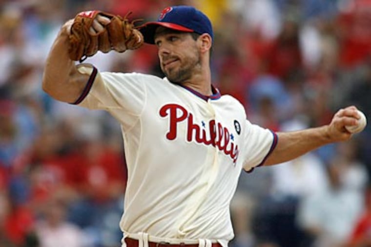 Cliff Lee pitched eight innings, allowed one earned run, and struck out seven against the Cubs. (H. Rumph Jr/AP Photo)