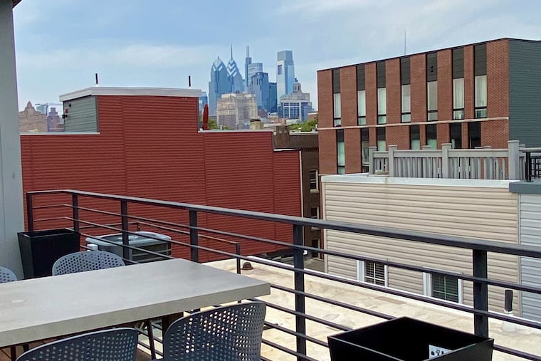 The roof deck at Emmy Squared offers views of Center City.