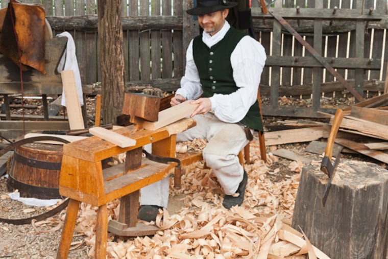 Journeyman cooper Marshall Scheetz making staves (for barrels) on Nov. 16, 2013 at the opening of the James Anderson Blacksmith and Public Armoury in Colonial Williamsburg’s Revolutionary City. Colonial Williamsburg uses Atlantic white cedar, a light long-lasting, rot-resistant wood often utilized by colonists for shingles, coming from Ocean County from trees knocked over by Superstorm Sandy in 2012. (Photo Credit: Barbara Temple Lombardi/The Colonial Williamsburg Foundation_