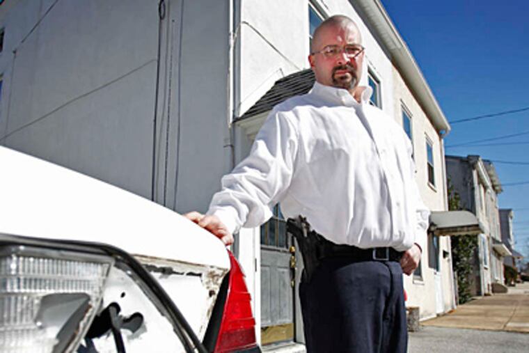 Fernando Antonio Salguero says police blew his trunk open because he wouldn't let them open it without a warrant. Cops say it was opened after a K-9 detected explosive materials inside. ALEJANDRO A. ALVAREZ / STAFF PHOTOGRAPHER