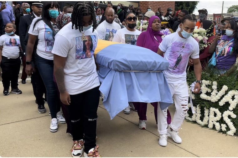 Pallbearers carry the casket of Tiffany Fletcher, the Parks and Recreation worker killed at Mill Creek Playground on Sept. 9, after her funeral service Monday.