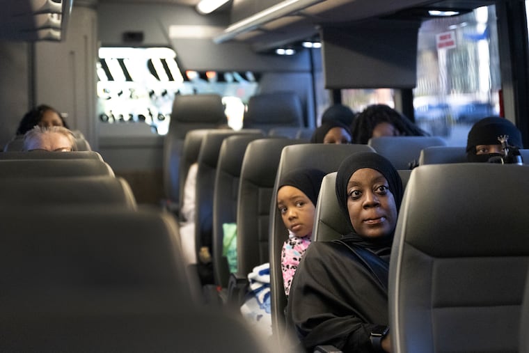 Passengers look on moments before departing on a four-hour bus ride to visit their family members at SCI Benner in Bellefonte, Pa. The Philadelphia Prison Society once ran 10 monthly bus routes that carried families across the state to visit incarcerated loved ones — nearly 3,000 trips a year. This year, that has been reduced to just four trips total, and without state funding, the organization says it may have to shut down the program altogether.