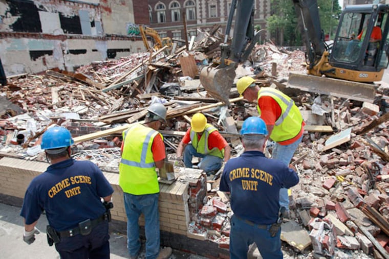 Demolition restarts at the site of this month's fatal building collapse at 22nd and Market Streets June 24, 2013. ( DAVID SWANSON / Staff Photographer )