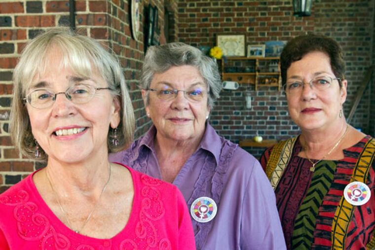 Eileen DiFranco (left), Patricia Fresen, and Andrea Johnson are among those gathering for the third meeting of Women’s Ordination Worldwide. (CHARLES FOX/Staff Photographer)