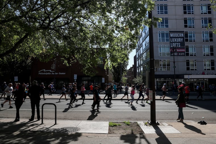 Participants race down Broad Street during the 10-mile Blue Cross Broad Street Run in Philadelphia.