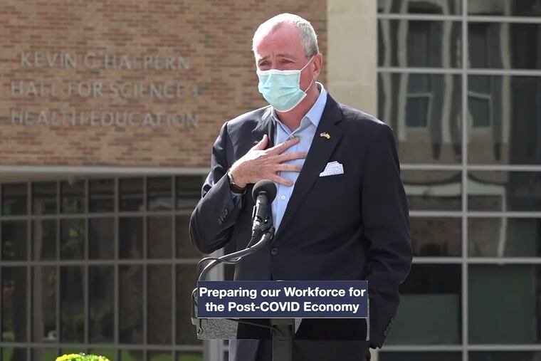 In this photo taken from video provided by the New Jersey Governor's Office, Gov. Phil Murphy informs listeners in Blackwood on Wednesday that he's about to go into quarantine.