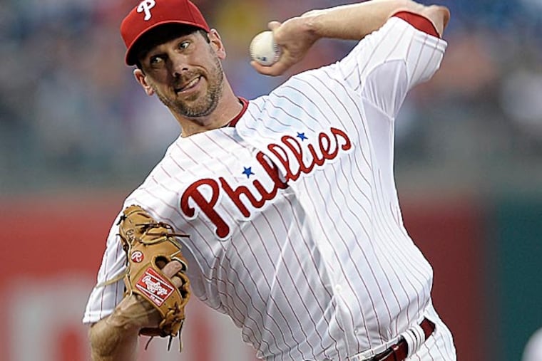 The Phillies' Cliff Lee throws a pitch in the first inning. (Michael Perez/AP)