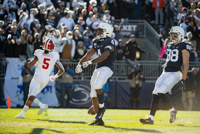 Penn State's Journey Brown (4) celebrates his 35-yard touchdown run in the third quarter of Saturday's home win over Indiana.