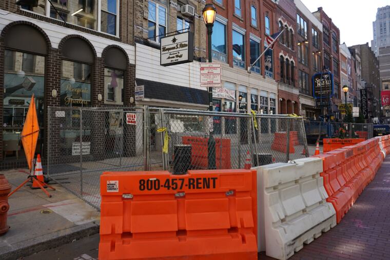 Barricades on Jewelers Row, where Toll Bros. City Living is beginning geo-technical work in preparation for its planned condo-tower project